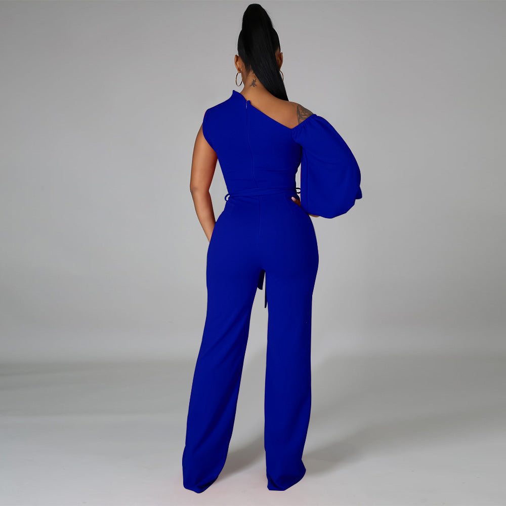 PIPA One-Shoulder Wide Leg Jumpsuit - Model standing to the back in blue lapis lazuli